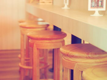 Close-up of wooden containers on table