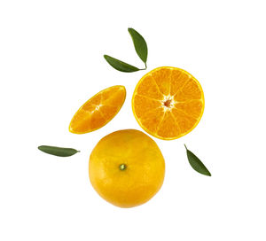 Close-up of oranges against white background