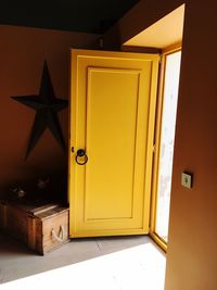 Close-up of yellow door