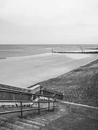 High angle view of steps leading towards beach