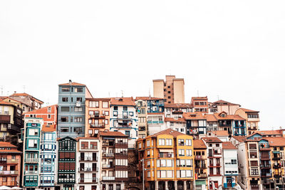 Low angle view of buildings against clear sky