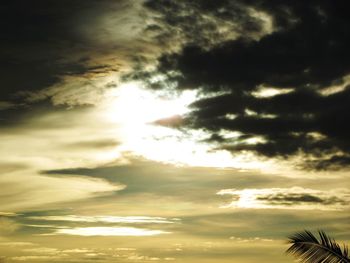 Low angle view of cloudy sky at sunset