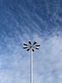 Low angle view of street light against sky