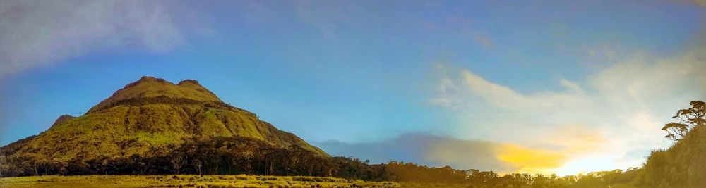Low angle view of rock formation against sky