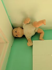 High angle view of doll on floor