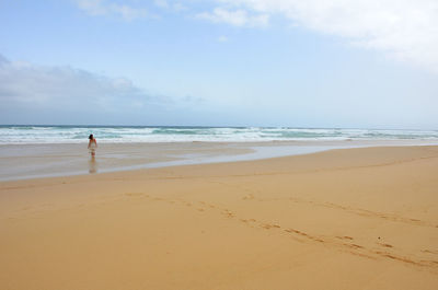 Scenic view of beach against sky
