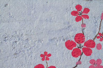 Close-up of heart shape on concrete wall