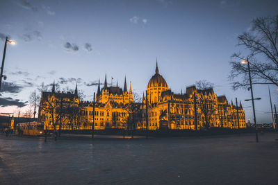 View of illuminated buildings against sky