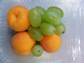 High angle view of apples in bowl on table