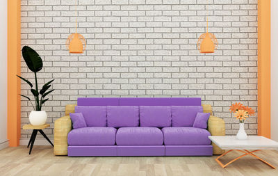 Empty chair against wall at home