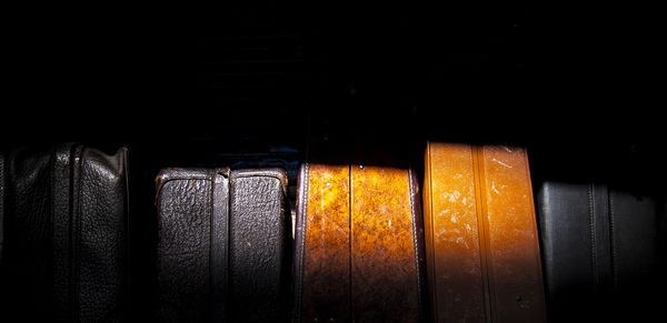 Close-up of illuminated lamp against black background