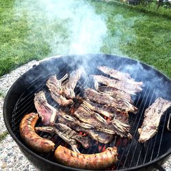 Close-up of meat on barbecue grill