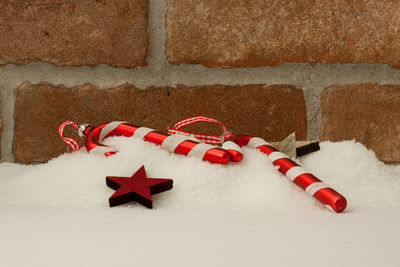 Close-up of christmas decoration on snow