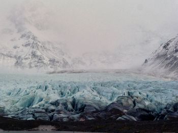 Scenic view of snow covered landscape