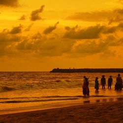 Scenic view of sea at sunset