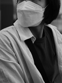 Close-up of woman wearing hat