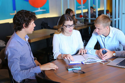 Business colleagues working at office