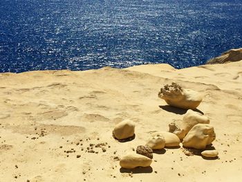 High angle view of rocks on beach