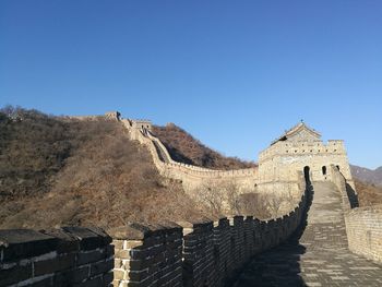 Low angle view of fort against clear sky