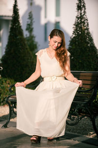 Young woman sitting outdoors