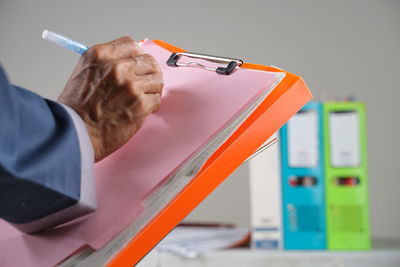 Close-up of man working on table