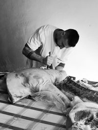 The butcher cut up the pork's carcass