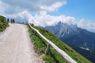 Panoramic view of road amidst mountains against sky