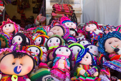 Portrait of toys for sale at market stall