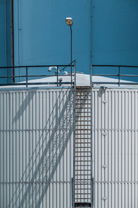 Low angle view of ladder against building