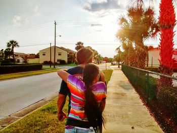 Rear view of woman standing in park