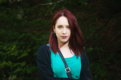 Portrait of beautiful woman with redhead