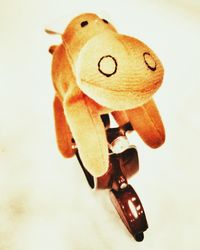 Close-up of toy over white background