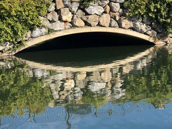 Arch bridge over lake