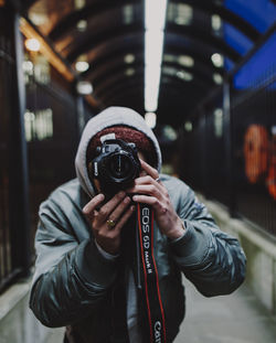 Midsection of person photographing