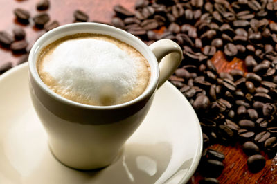 Close-up of coffee cup on table