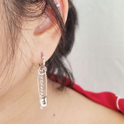 Close-up of woman with hair over white background