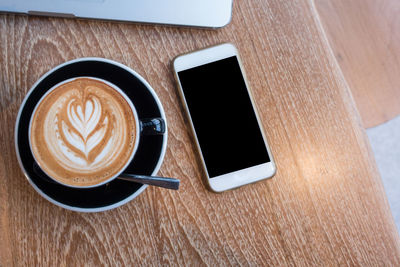 High angle view of coffee on table