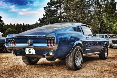 Vintage car against blue sky