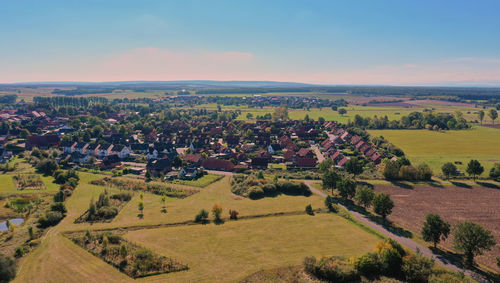 Overview of a suburb ener industrial city with fields, meadows and green  in the surrounding area