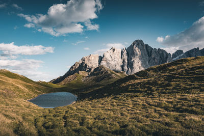 Scenic view of landscape and mountains against sky