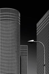 Low angle view of building against sky in city