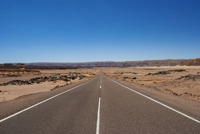 View of empty road against clear sky