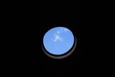 Low angle view of moon against sky at night