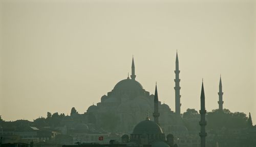 Low angle view of mosque against clear sky