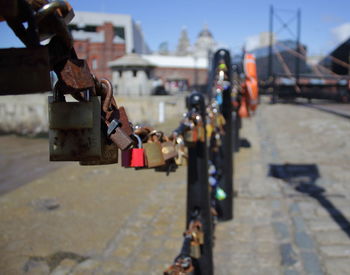 Close up of padlocks on railing