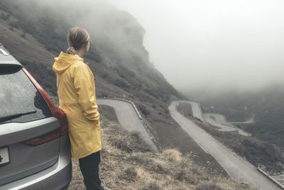 Woman looking at road