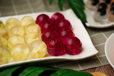 Close-up of fruits in plate on table