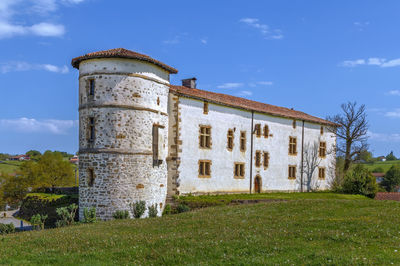 Exterior of historic building against sky