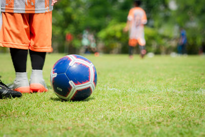 Man playing soccer on field