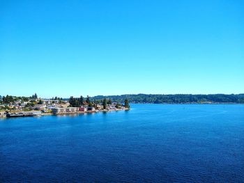 Scenic view of port orchard against clear blue sky